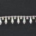 Galon avec pendants facettés en plastique sur fil coton, cristal irisé