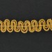 Gilded banding with glass tubes, waves pattern on cotton thread