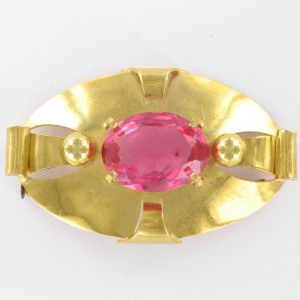 Oval brooch with rose stone, gilded 59x35 mm