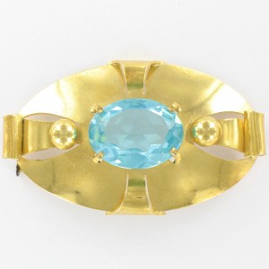 Oval brooch with aquamarine stone, gilded 59x35 mm