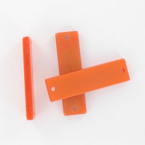 Rectangular plaque with 2 holes, orange 35x10 mm