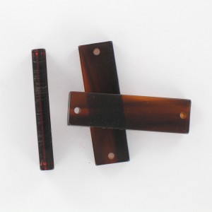 Rectangular plaque with 2 holes, tortoise shell 35x10 mm