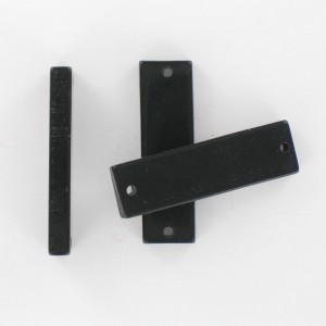 Rectangular plaque with 2 holes, black 35x10 mm