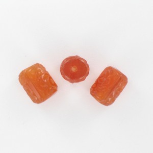 Cylinder bead with embossed patterns, cornelian 14x11 mm